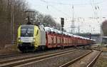 TXL/DISPO 182 511-6(REV/Lz/30.03.12) mit Autozug auf dem Weg nach Bremen.