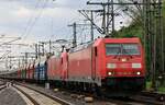 DB 185 301-9 + 185 058-5 mit leerem Transportzug unterwegs zum Hasaport.