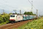 Crossrail 185 580-8 mit dem Fiat-Autozug bei der Durchfahrt in Ahlten.