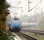 185 519-6 rauscht hier mit dem  Zement-Express  aus Deuna nach Padborg durch Schleswig.