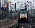 MRCE/TXL 185 407-4 mit dem DGS 45697(Malmö Godsban - Wanne-E Wof)aufgenommen bei der Durchfahrt im Bhf Neumünster.