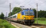 ELOC/NS 193 931-3 vor IC 143 Amsterdam-Berlin beim Bü Lotte, 05.06.2024 