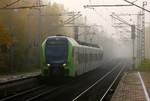 Nordbahn ET 06.01(1430 536-1,1830 936-9,636-5,336-2,036-8 und 1430 036-2) als RB71 nach Wrist hat am Morgen des 04.11.2015 Einfahrt in Elmshorn.