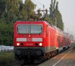 143 250-9 mit S1 von Warnemnde nach Rostock Hbf bei der Einfahrt im S-Bahnhof Rostock-Holbeinplatz.23.08.2013