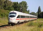 411 084-7 als ICE 1631 von Warnemünde nach Berlin-Südkreuz bei der Durchfahrt in Rostock-Lichtenhagen.20.07.2024