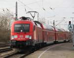 ex Railion 182 012-5 mit RE 37376 von Cottbus nach Wismar bei der Einfahrt im Bahnhof Bad Kleinen.28.12.2011