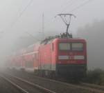 112 107-8 mit RE 4357 von Rostock Hbf nach Berlin Sdkreuz bei der Durchfahrt in Sildemow am 09.09.2012