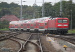 112 118 mit RE 18490(Berlin-Warnemnde)bei der Ausfahrt im Rostocker Hbf.03.09.2016