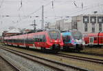 442 354 als S2(Warnemünde-Güstrow)bei der Ausfahrt im Rostocker Hbf.04.12.2020