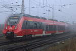 442 357 als S2(Warnemünde-Güstrow)bei der Ausfahrt im Rostocker Hbf.17.03.2021