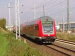 RE 33109 von Rostock Hbf Richtung Lutherstadt Wittenberg bei der Ausfahrt im Rostocker Hbf.(02.10.10)