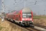 Rostocker S-Bahn Linie 2 von Warnemnde nach Gstrow bei der Durchfahrt in Sildemow.16.03.2012