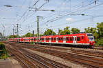   Zwei gekuppelte ET 423 der S-Bahn Köln erreichen am 01.06.2019, als S 19 nach Hennef (Sieg), den Bahnhof Köln Messe/Deutz.