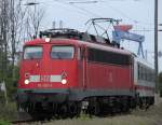 110 493-4(DB Regio NRW GmbH Dortmund)mit dem DZ 2681  BahnTouristikExpress-Norwegain Cruise Line ,von Potsdam nach Warnemnde kurz nach der Ankunft im Bahnhof Warnemnde.(27.05.2011)