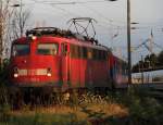 Seitenaufnahme von 113 309-9 im Bahnhof Warnemnde.(11.07.2011)