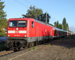 112 102 mit RE 13290(Warnemnde-Berlin)bei der Durchfahrt im Haltepunkt Rostock-Holbeinplatz.02.09.2016