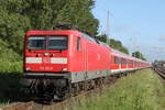 112 102 mit RE 13290 von Warnemnde nach Berlin-Ostbahnhof bei der Durchfahrt in Rostock-Bramow.05.06.2017