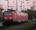 143 860-5 mit S1 von Rostock Hbf nach Warnemnde bei der Einfahrt im Bahnhof Warnemnde.16.10.2011