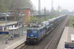 140 853-3 EGP mit Neuwagen am Haken.
