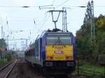 146 519-4 schiebt ihren InterConnex 80003 von Leipzig Hbf Richtung Warnemnde bei der Ausfahrt im Haltepunkt Rostock-Holbeinplatz.(25.09.10)