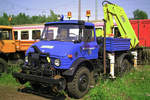 MWB-Zweiwege Unimog am 07.08.2010 in Eystrup. (175 Jahre Eisenbahn in Deutschland, Fahrzeugausstellung)