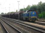 MWB-LOK V2304 wartet mit einem Dngerzug(Rostock-Bramow - Poppendorf)  auf die Ausfahrt im Bahnhof Rostock-Bramow um 06.15(02.07.10) 