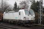 Railpool-Vectron 193 814-1 mit Holzzug von Rostock-Bramow nach Stendal-Niedergrne bei der Ausfahrt im Bahnhof Rostock-Bramow.21.02.2015