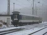 Zwei ABomzwagen von IntEgro und ein ABomz in DR-Farben,am 27.Januar 2013,abgestellt in Bergen/Rgen.