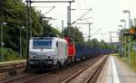 Akiem/HLG 37053 hat hier zusammen mit der ex LTE 2150.902 nun 1275 120-4 und einem Holz-Leer-Zug Einfahrt in den Schleswiger Bahnhof.