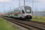 4110 115-1 mit IC 2179(Warnemünde-Dresden)bei der Ausfahrt im Rostocker Hbf.29.05.2022