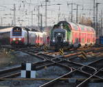 4746 053 als  RE 9(76368)von Sassnitz nach Rostock Hbf bei der Einfahrt im Rostocker Hbf neben an kam zum richtigen Moment 650 114-8 raus.30.12.2019