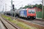 482 041-1 der SBB Cargo mit einem Kesselzug in Rathenow in Richtung Wustermark.