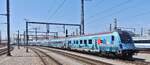�BB Steuerwagen des Railjet im speziellen Outfit, welches Werbung f�r das Klima Ticket macht am Ende des Doppelzuges beim Ausfahren aus dem Bahnhof Wien in Richtung M�nchen.