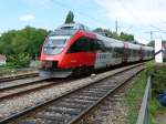 4024 032 der S-Bahn Vorarlberg (BB) befhrt am 11.07.2009 gerade den Bodenseedamm in Lindau.