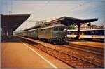 Die SBB Re 4/4 I 10041 ist mit einem Regionalzug auf dem Weg nach Lausanne und konnte beim Halt in Renens VD fotografiert werden.
