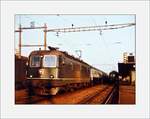 Die SBB Re 6/6 11644 wartet mit dem Hispania-Express (zwei SNCF Liegwagen sind im Bild zu erkennen) Hamburg /Dortmund - Basel - Genève- Port Bou auf die Abfahrt.