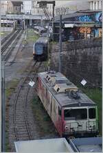 Ein Blick in den  Hinterhof  der MOB mit der abgestellten GDe 4/4 6006 (ex GMF/TPF) und einen GEX.