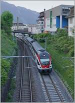 Die SBB RABe 511 114 und 115 erreichen als RE33 nach Annemasse Montreux.