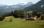 Oberhalb von Les Planches ist der inzwischen neu lackierte ABFe 4/4 2 im Juli 1983 von Les Diablerets nach Aigle unterwegs