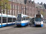 amsterdam-gvb/334874/gvba-tw-780-und-833-amsterdam GVBA TW 780 und 833 Amsterdam Centraal Staion 02-04-2014.

GVBA tram 780 en 833 Stationsplein, Amsterdam CS 02-04-2014.