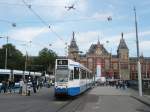 GVB TW 801 Centraal Station. Middentoegangsbrug, Amsterdam 19-08-2015.

GVB tram 801 op de Middentoegangsbrug voor het centraal station. Amsterdam 19-08-2015.